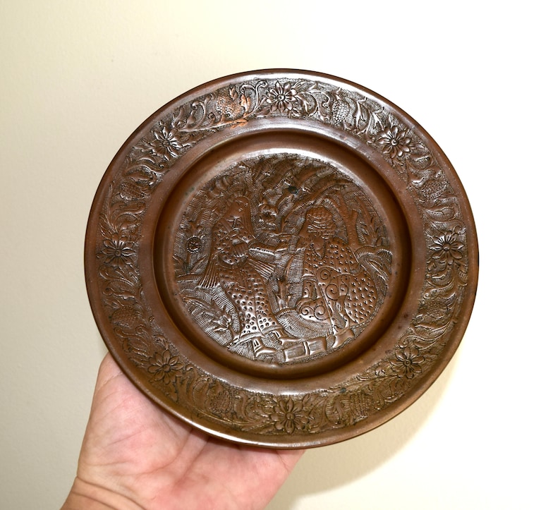Vintage etched copper plate or tray...engraved with woman serving man wine...ghalamzani...، نمای 3
